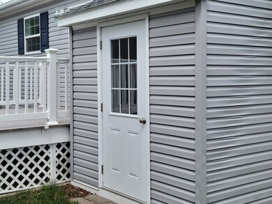 Rear attached service shed.
