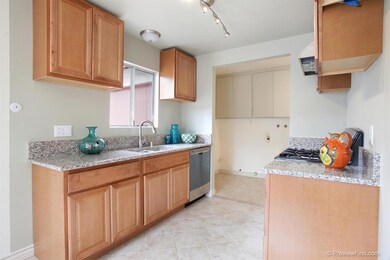 New cabinets, Granite counter tops; stainless steal gas stove/oven; dishwasher; sink; tile floors!