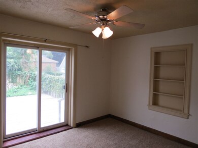 Bedroom with Patio doors that open to the large de