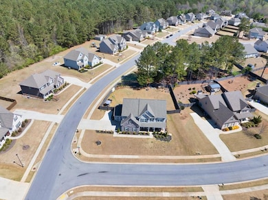 Aerial view with a residential view and a forest v