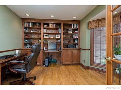 Den. Den/Office with hardwood floors feature medal