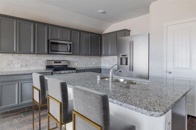 Beazer Homes Stark Farms. This is not an actual photo of the home but is an actual photo of the Brooks floorplan.