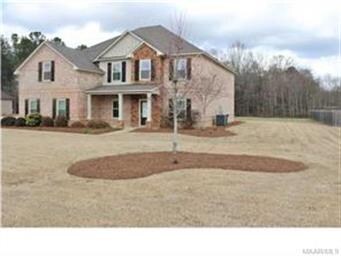 RIGHT SIDE VIEW SHOWING HEAT PUMP, LANDSCAPE AND VIEW INTO BACK YARD
