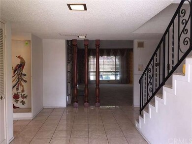 Main floor foyer lead to living room and stairway 