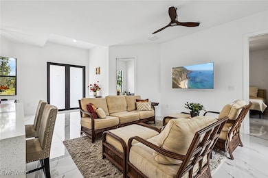 Living area featuring recessed lighting, plenty of