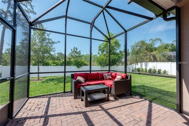 Gather with guests in the beautiful screened lanai