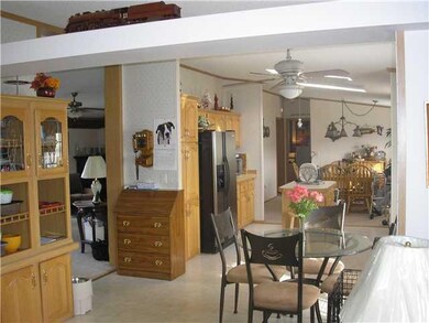 Kitchen. The kitchen eating area is adjacent to th