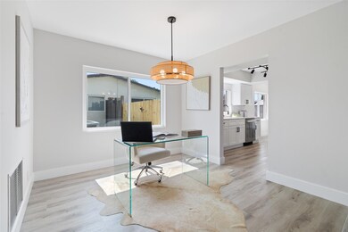 ONE OF TWO DINING ROOMS