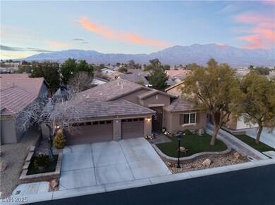View of front facade with a yard, a mountain view,