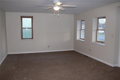 Spacious Living Rm with new carpeting and windows!