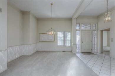 Another view of Dining Room and Entry Hall.
