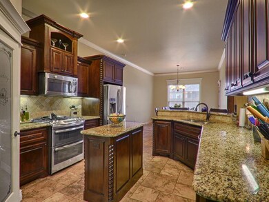 Large Kitchen has Custom Center Island, Granite Co