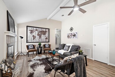 Spacious family room with high ceilings.