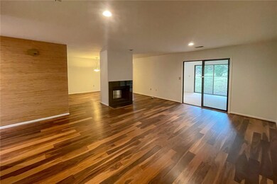 Living and Dining Rooms from foyer with view of su