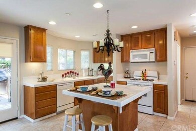The Spacious Kitchen opens to the family room and 