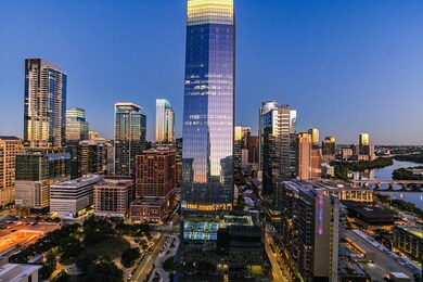 View of city skyline with a nearby body of water