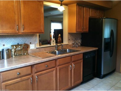 Kitchen with view into the Family Room
