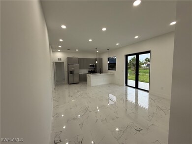 Unfurnished living room featuring recessed lightin