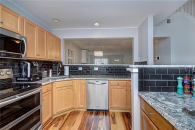New granite and custom tile back splash! Stunning!
