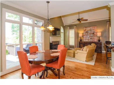 Kitchen eating area with transom windows and views