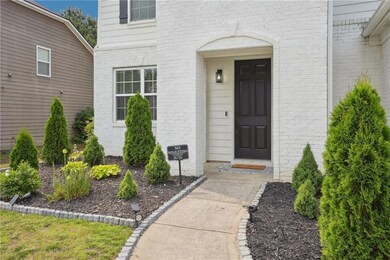 Entrance to property with brick siding