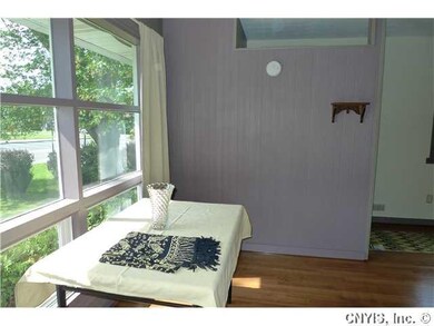 Living Room. Dining area has large window giving l