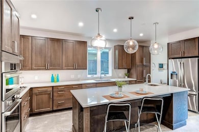Kitchen with appliances with stainless steel fini