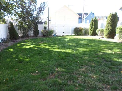 Yard/Garden. Pretty landscaped back level yard