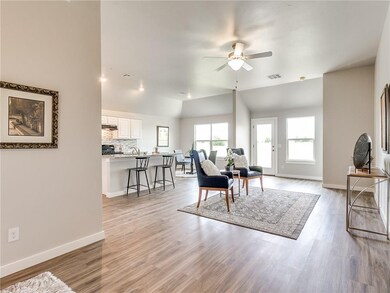 Living Room - Wood-style floors, ceiling fan and a