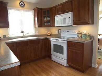 Kitchen. Extra wide food prep area is nicely accen