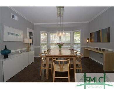 Dining Room. Built-in shelves, lots of light, parq