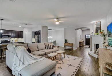 Open to the kitchen, the cook never gets left out of the conversation.