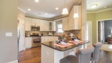 Goodall cottage homes are known for their large, open kitchens. 42 inch cabinets, granite countertops, SS appliances.
