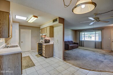 Kitchen has newer appliances, skylight & plenty of storage.