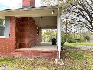 Side porch, perfect for screening.