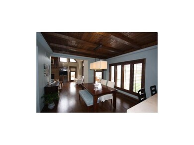 Gorgeous beamed ceiling, gleaming wood floors, ton