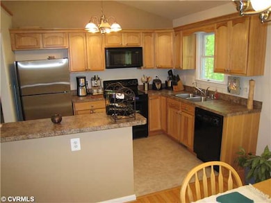 Kitchen - Custom Hickory cabinets, designer colors