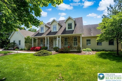 Lovely, Manicured Landscaping Surround this Home