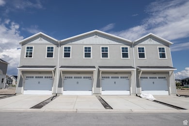 Wide garage with extended driveway