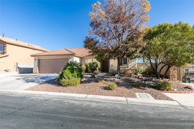 View of front of house featuring stucco siding, an