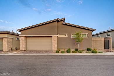 View of side of home featuring stucco siding, an a