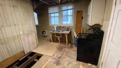 View of Demo'd Kitchen. Sink was connected to be u