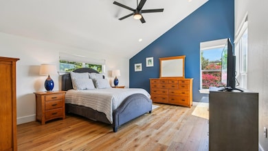 Bedroom featuring light wood-style floors, recess