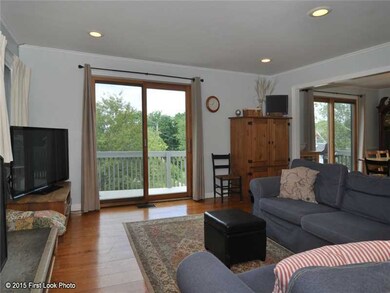 Living Room. Sliders to the deck and winter water