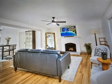 Cozy living room with wood burning fireplace