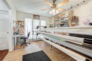 The front living / flex space is currently utilized as a work space.  The size of this space will allow you to utilize it however you need...play area, game room, media room, library, home office.