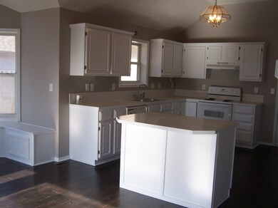 12' x 13', New Cabinets, Hardwood Flooring, Island