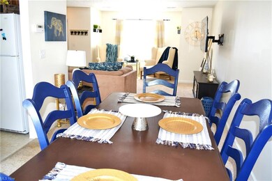 Spacious dining room opens to the living room, the