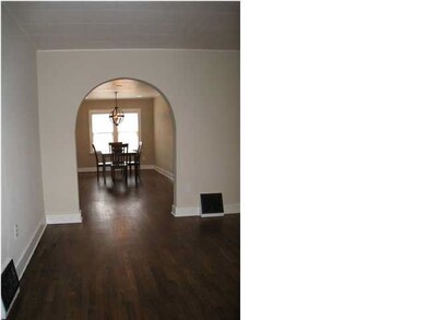 Arched doorway is just another charming attribute 