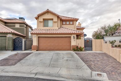 View of front of home featuring stucco siding, a t